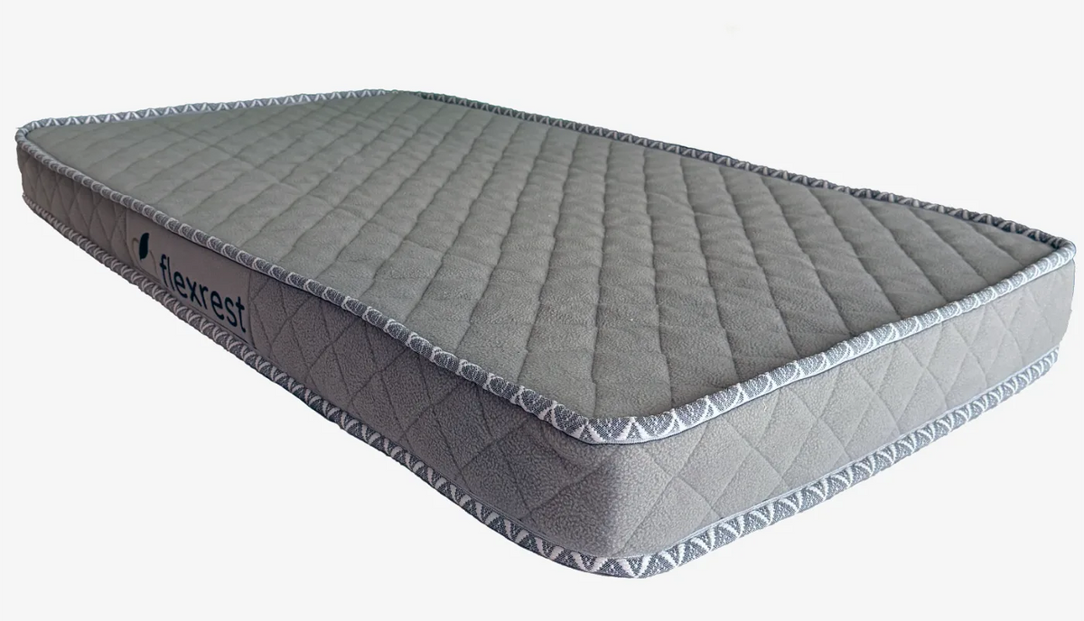 Flexrest Nurture reversible natural latex baby mattress, grey quilted cover with woven piping and the Flexrest label